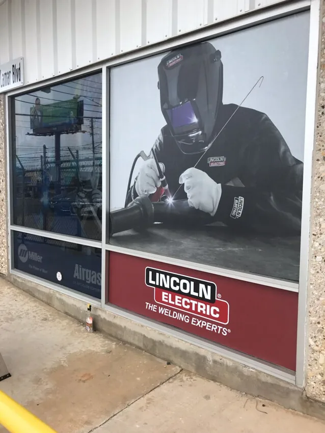Perforated commercial window graphic